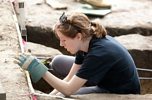 archaeologist working in field